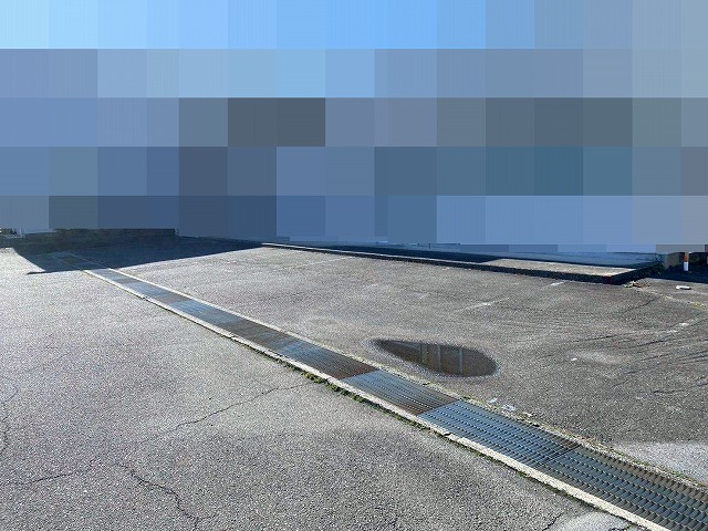 甲府市で駐車場（アスファルト）の黄色いハードライン引き工事（アトムライン使用）