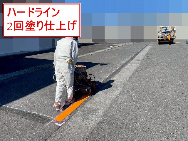 甲府市で駐車場（アスファルト）の黄色いハードライン引き工事（アトムライン使用）
